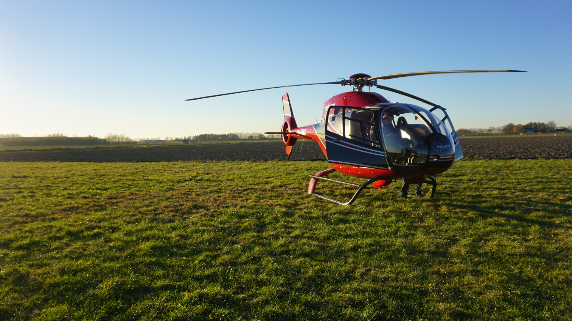 Helicopter landing at a private departure location in the Netherlands